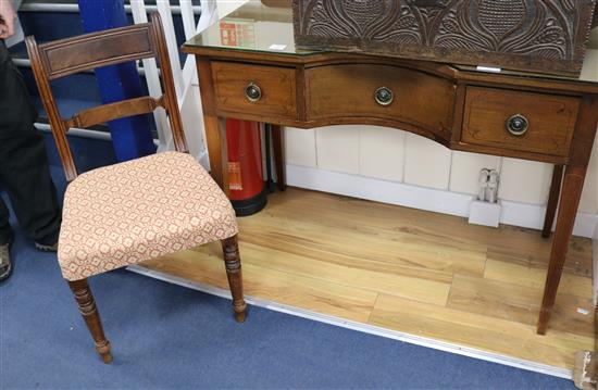 An Edwardian inlaid mahogany three drawer writing table & a chair